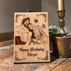 Personalised wooden photo frame on a table